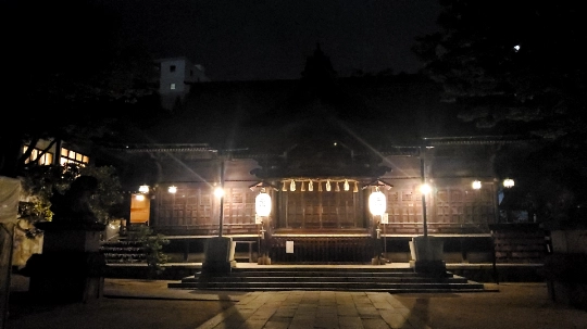 Yohashira Shrine main hall illuminated at night